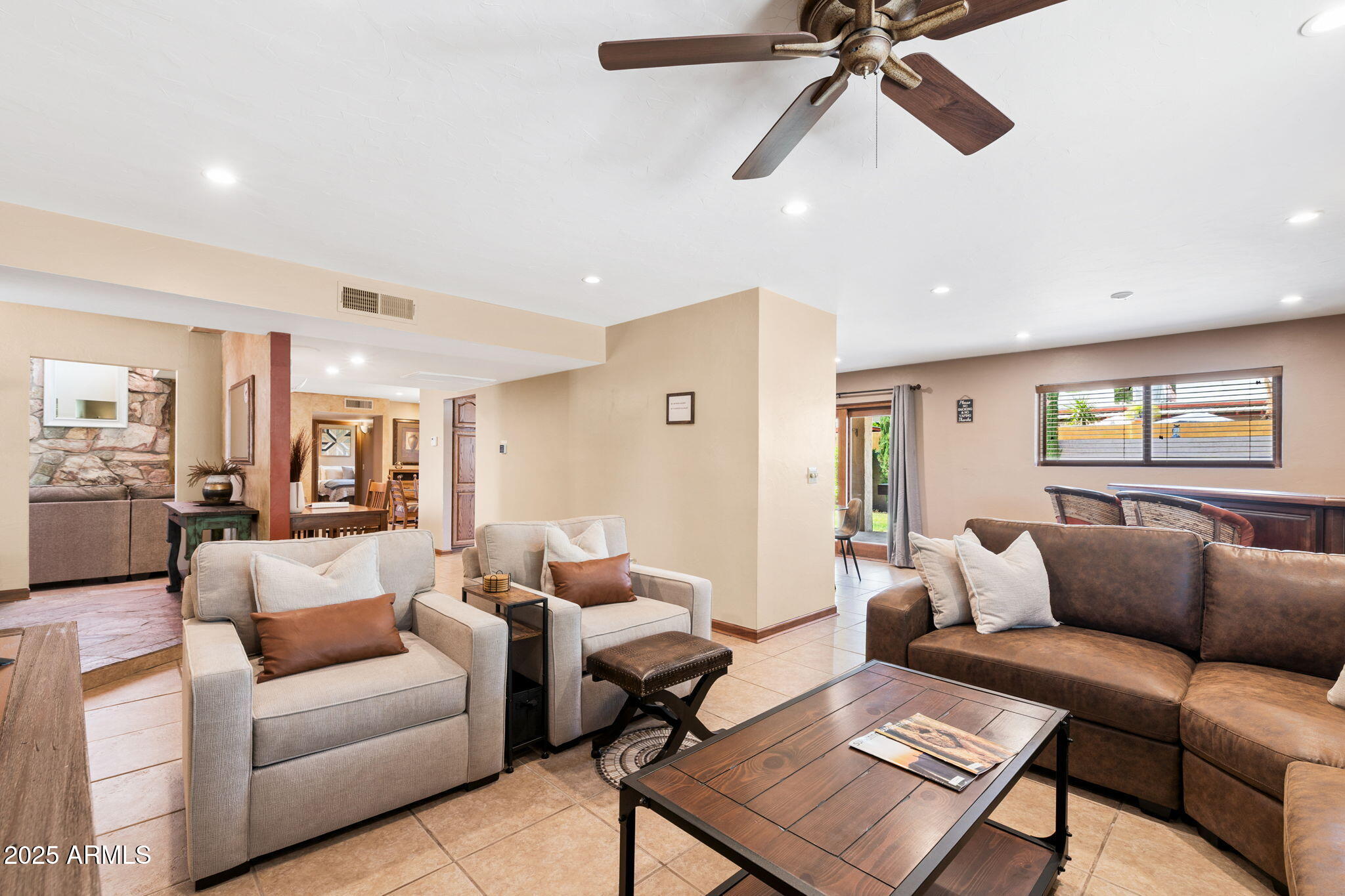 9972 East Del Monte Avenue Gold Canyon, AZ 85118 - Photo 29 of 49 a living room with furniture and a rug