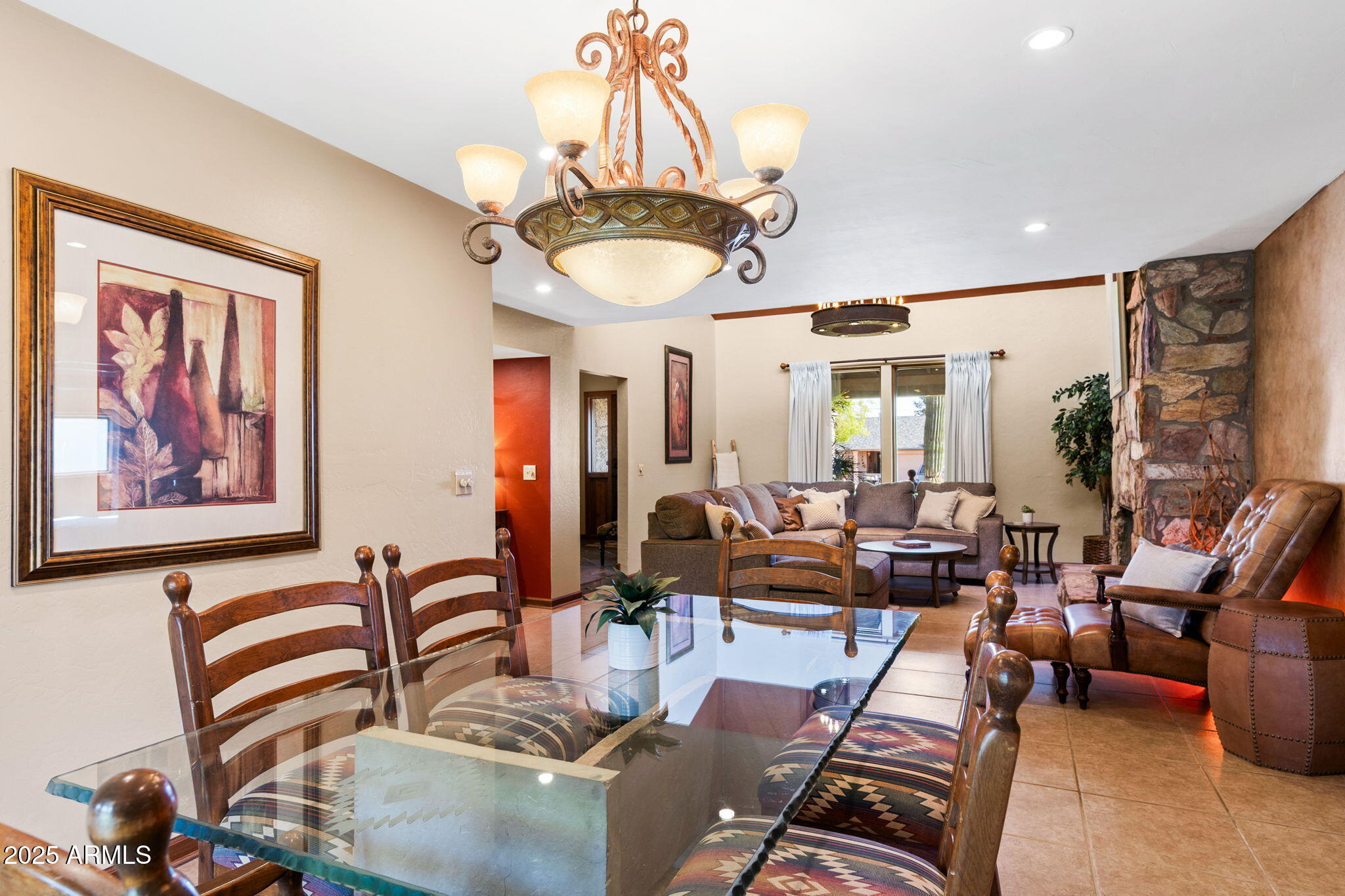9972 East Del Monte Avenue Gold Canyon, AZ 85118 - Photo 34 of 49 a very nice looking living room with furniture and a chandelier