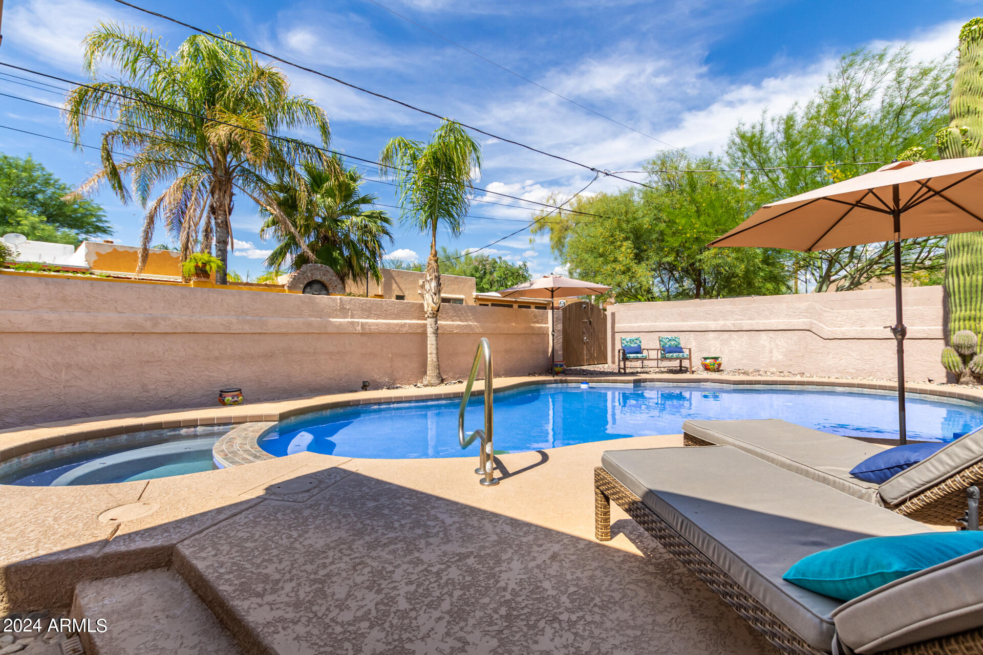 9972 East Del Monte Avenue Gold Canyon, AZ 85118 - Photo 40 of 49 a view of a backyard with potted plants