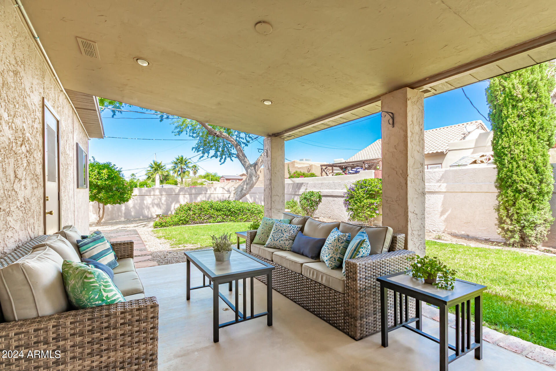 9972 East Del Monte Avenue Gold Canyon, AZ 85118 - Photo 47 of 49 a outdoor living space with furniture potted plant and a large window