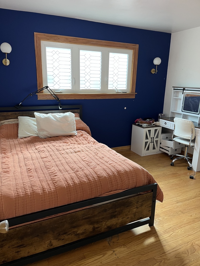 4505 West 55th Street Chicago, IL 60632 - Photo 10 of 15 a bedroom with a bed and a window