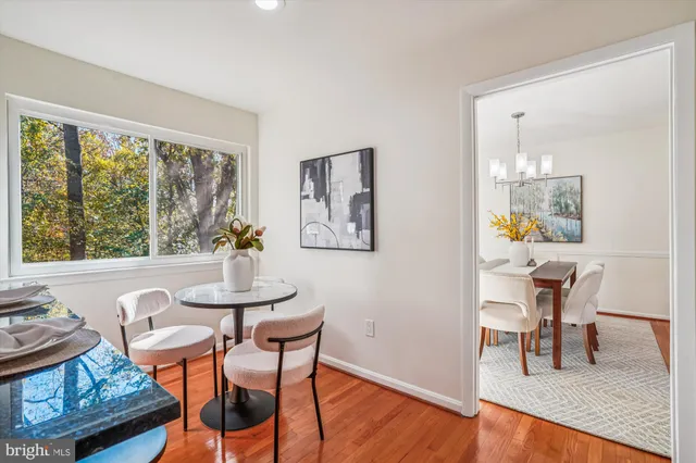 a bathroom with a shower and a window