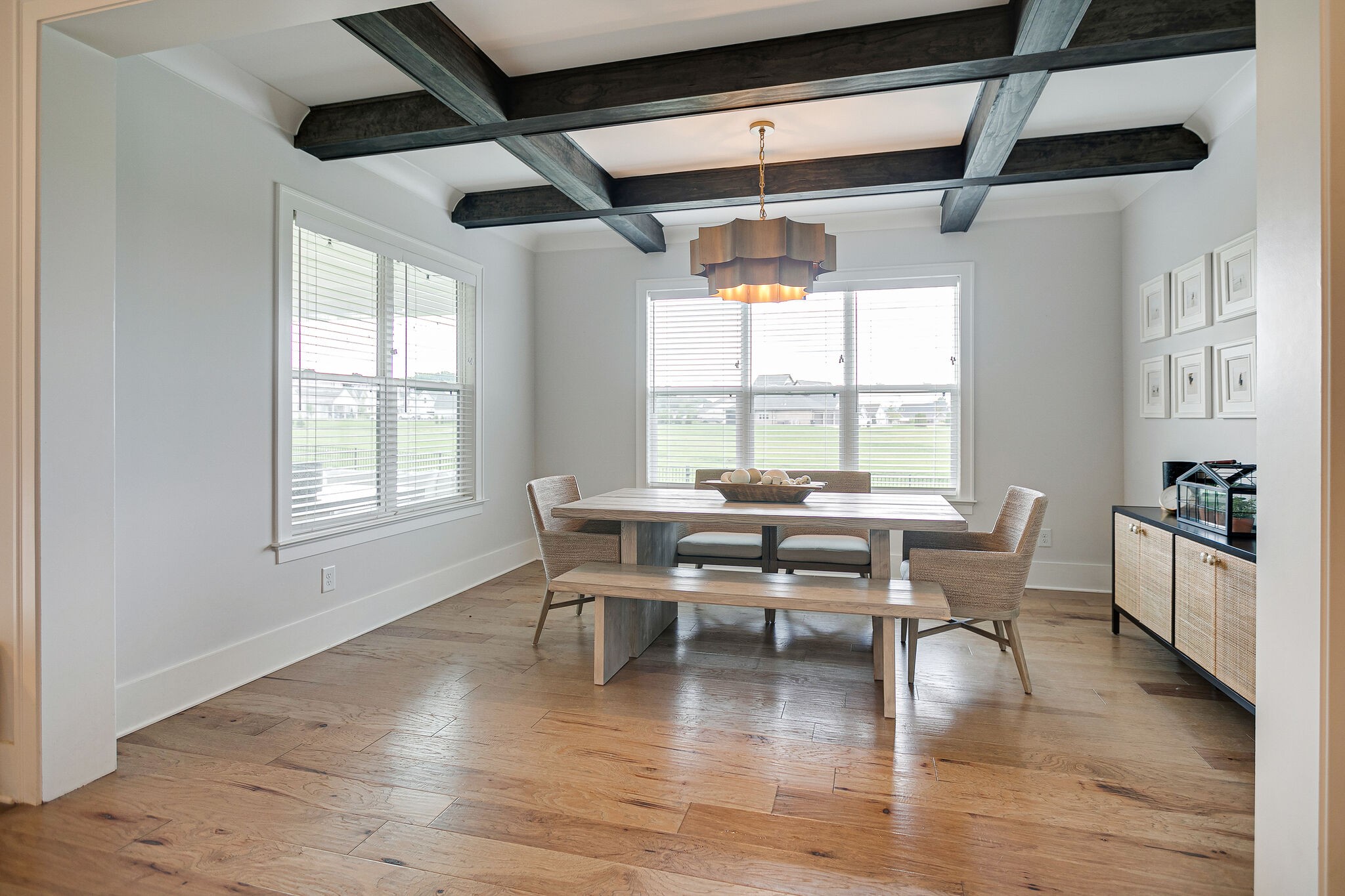 6563 Windmill Drive College Grove, TN 37046 - Photo 13 of 40 a view of a dining room with furniture window and wooden floor