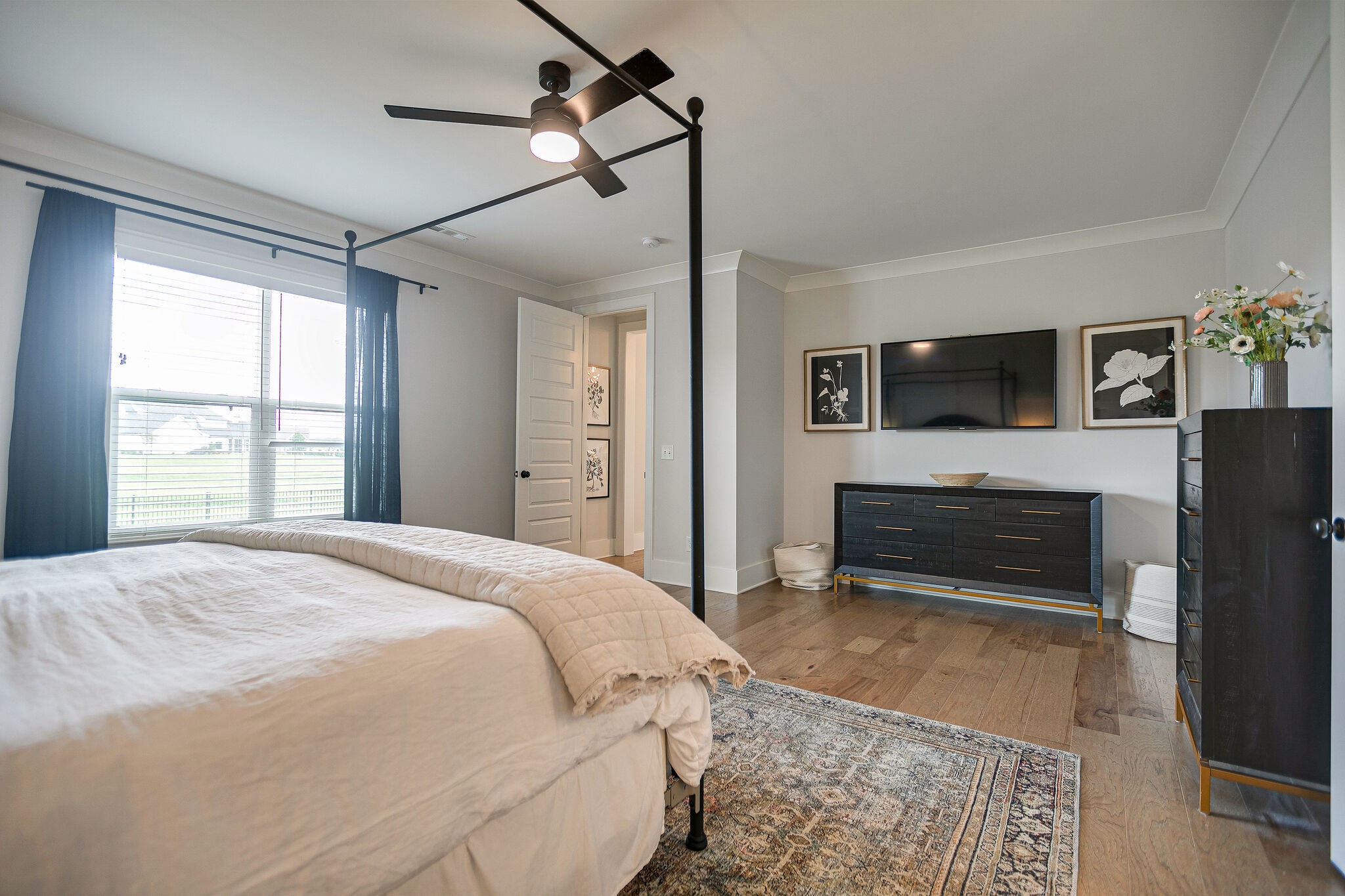 6563 Windmill Drive College Grove, TN 37046 - Photo 20 of 40 a bedroom with a bed and a television