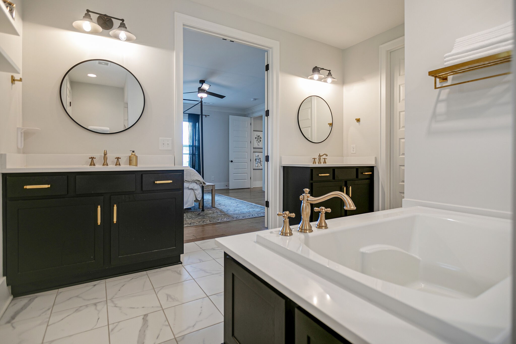 6563 Windmill Drive College Grove, TN 37046 - Photo 21 of 40 a bathroom with a sink vanity and a mirror
