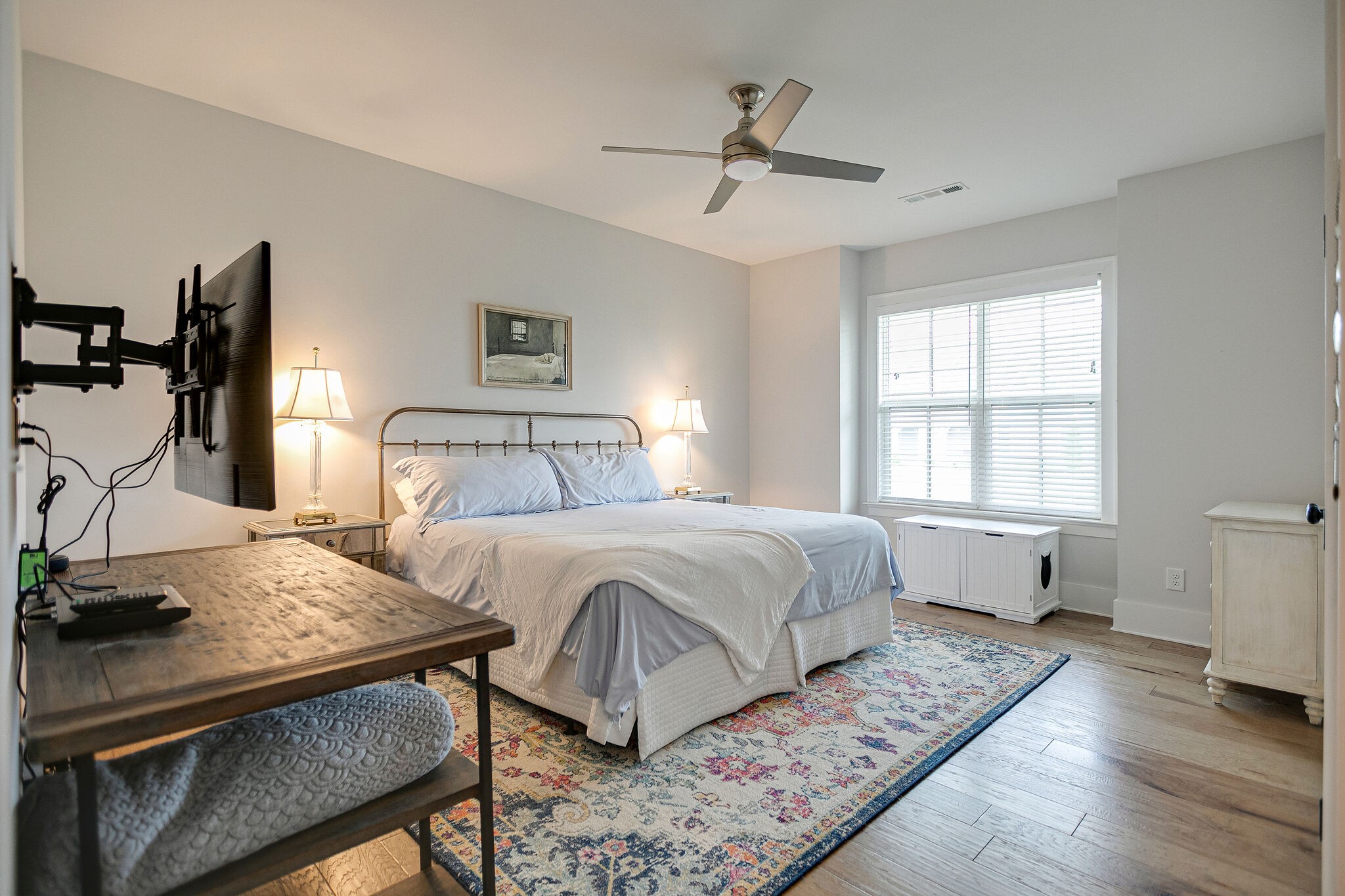 6563 Windmill Drive College Grove, TN 37046 - Photo 24 of 40 a bedroom with a bed and wooden floor