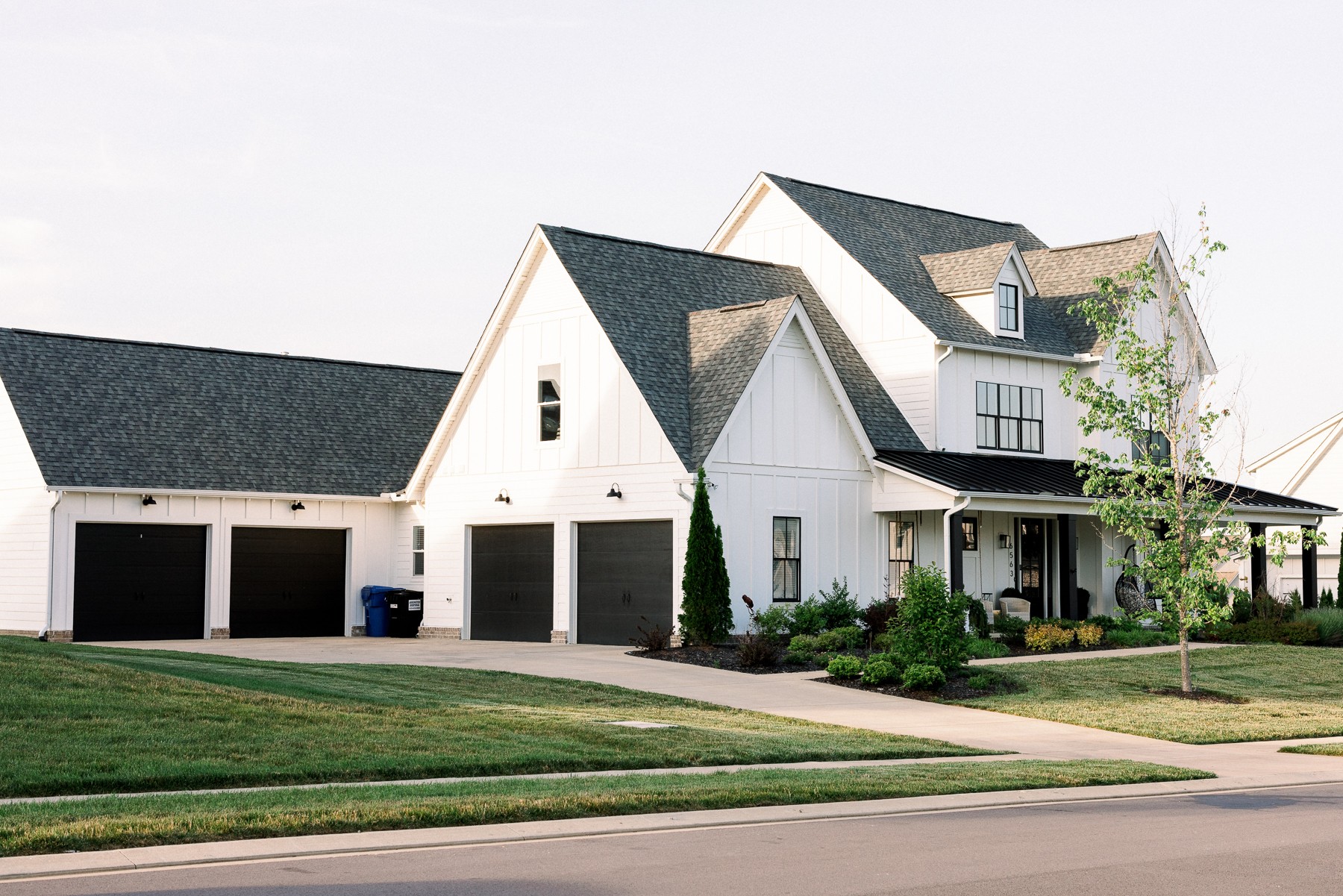 6563 Windmill Drive College Grove, TN 37046 - Photo 40 of 40 a view of a white house next to a yard with big trees