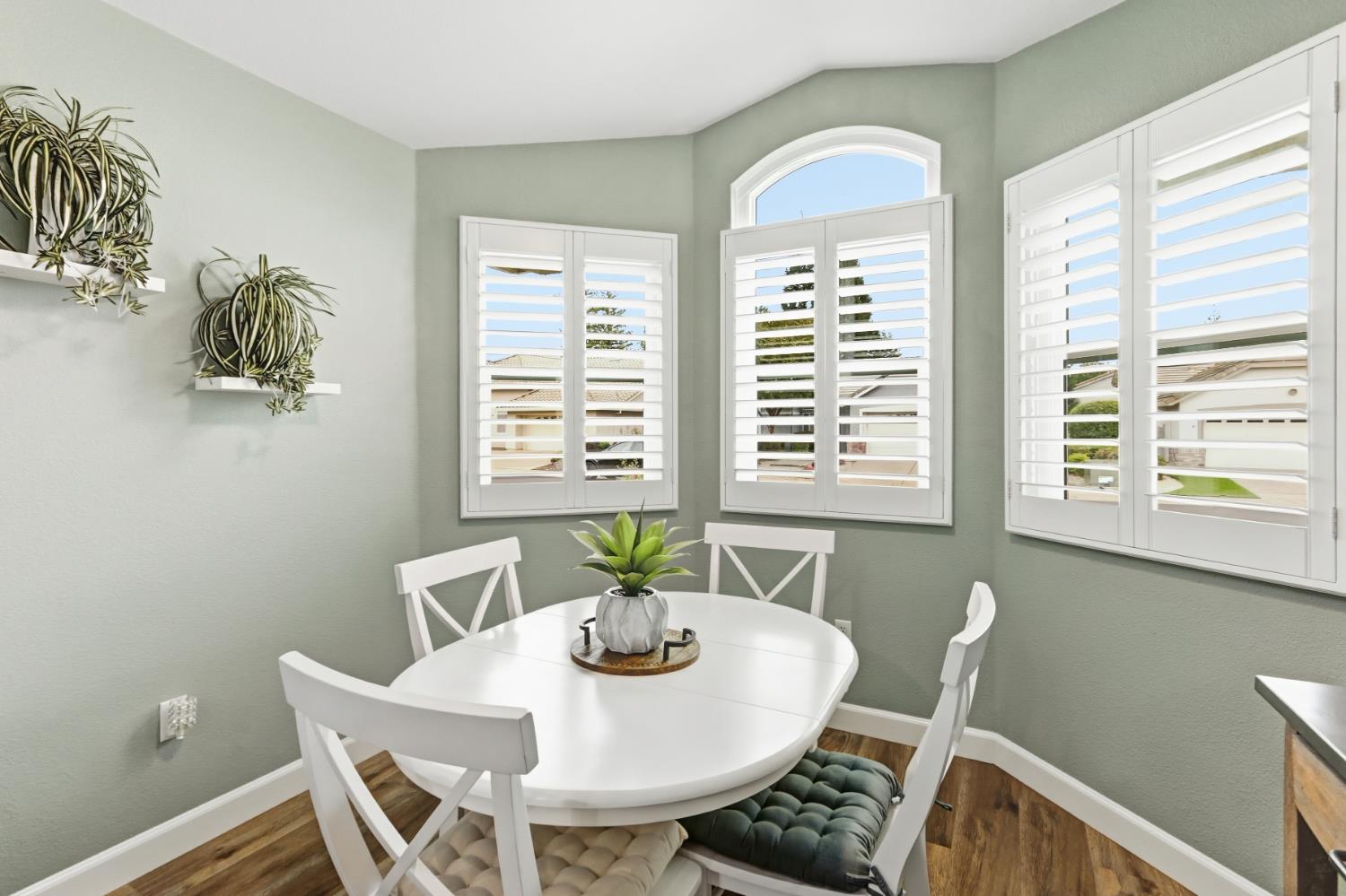 5297 Angelrock Loop Roseville, CA 95747 - Photo 17 of 33 a view of a dining room with furniture and windows