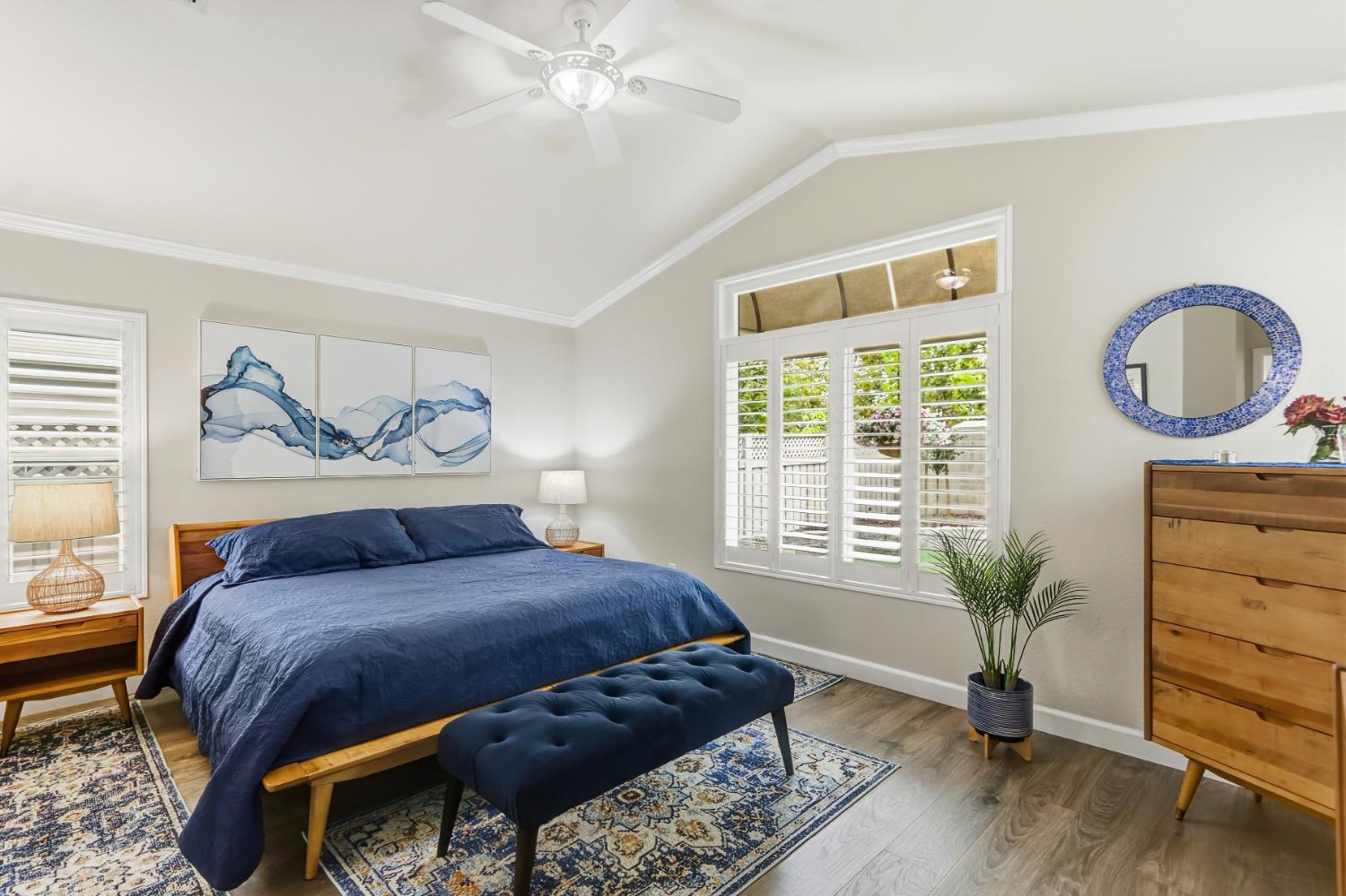 5297 Angelrock Loop Roseville, CA 95747 - Photo 18 of 33 a bedroom with a bed and wooden floor