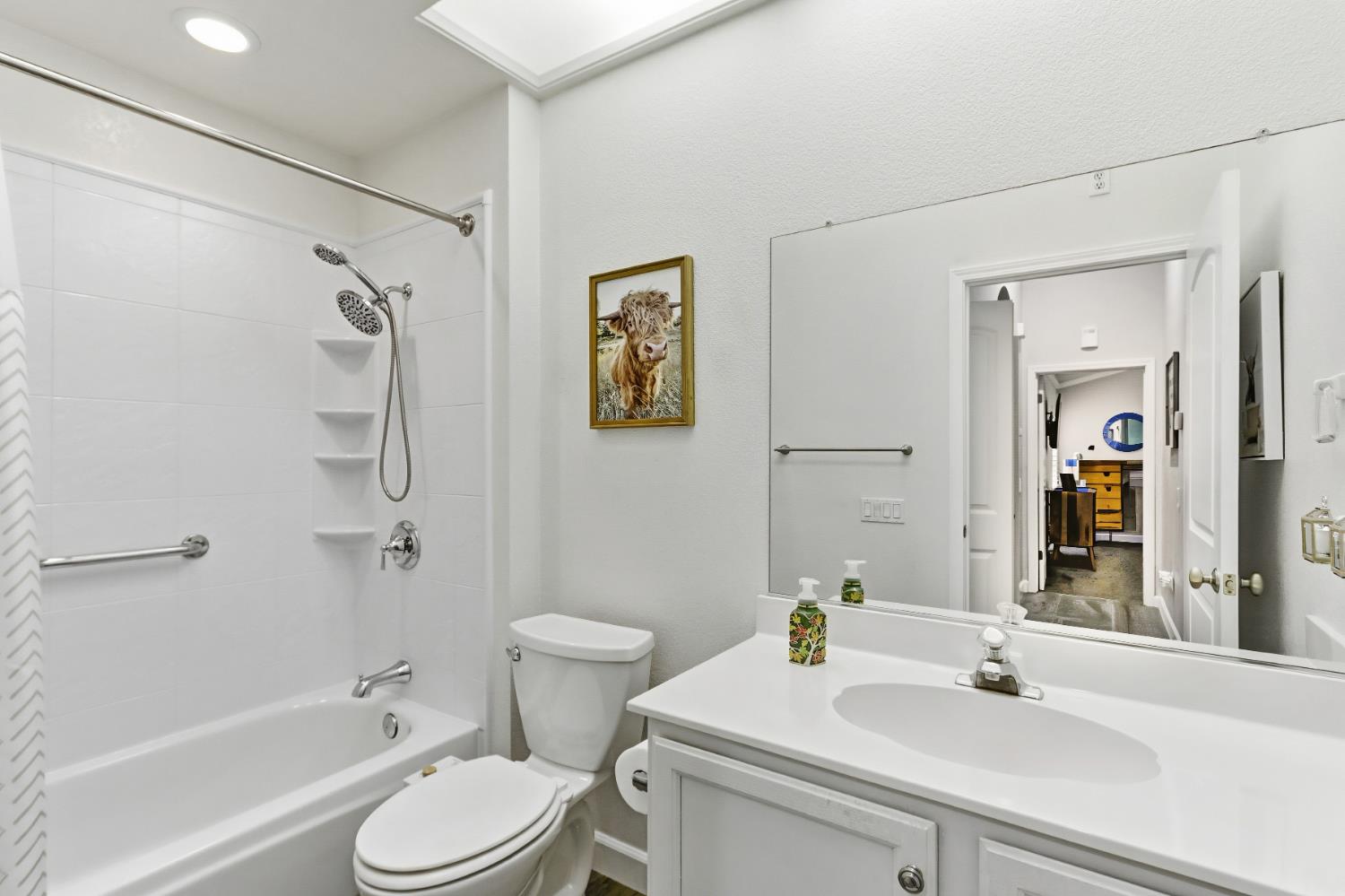 5297 Angelrock Loop Roseville, CA 95747 - Photo 27 of 33 a bathroom with a sink toilet and shower