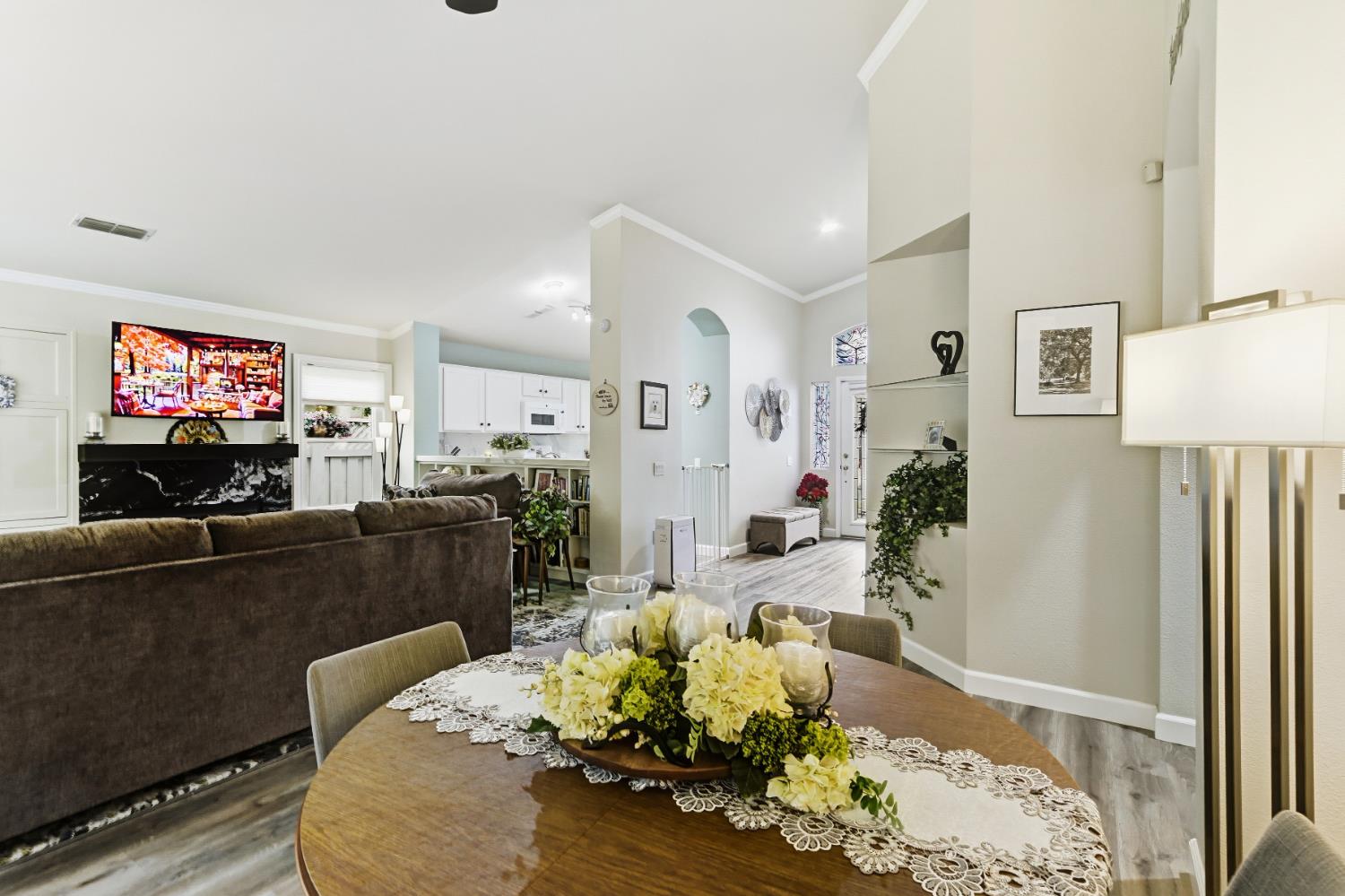 5297 Angelrock Loop Roseville, CA 95747 - Photo 10 of 33 a living room with furniture and a flat screen tv