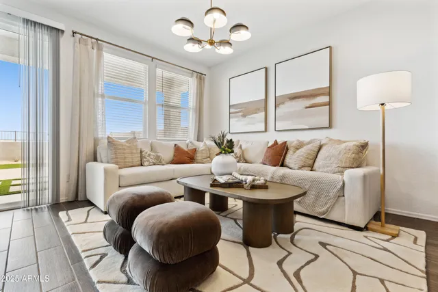 a spacious bedroom with a bed and window