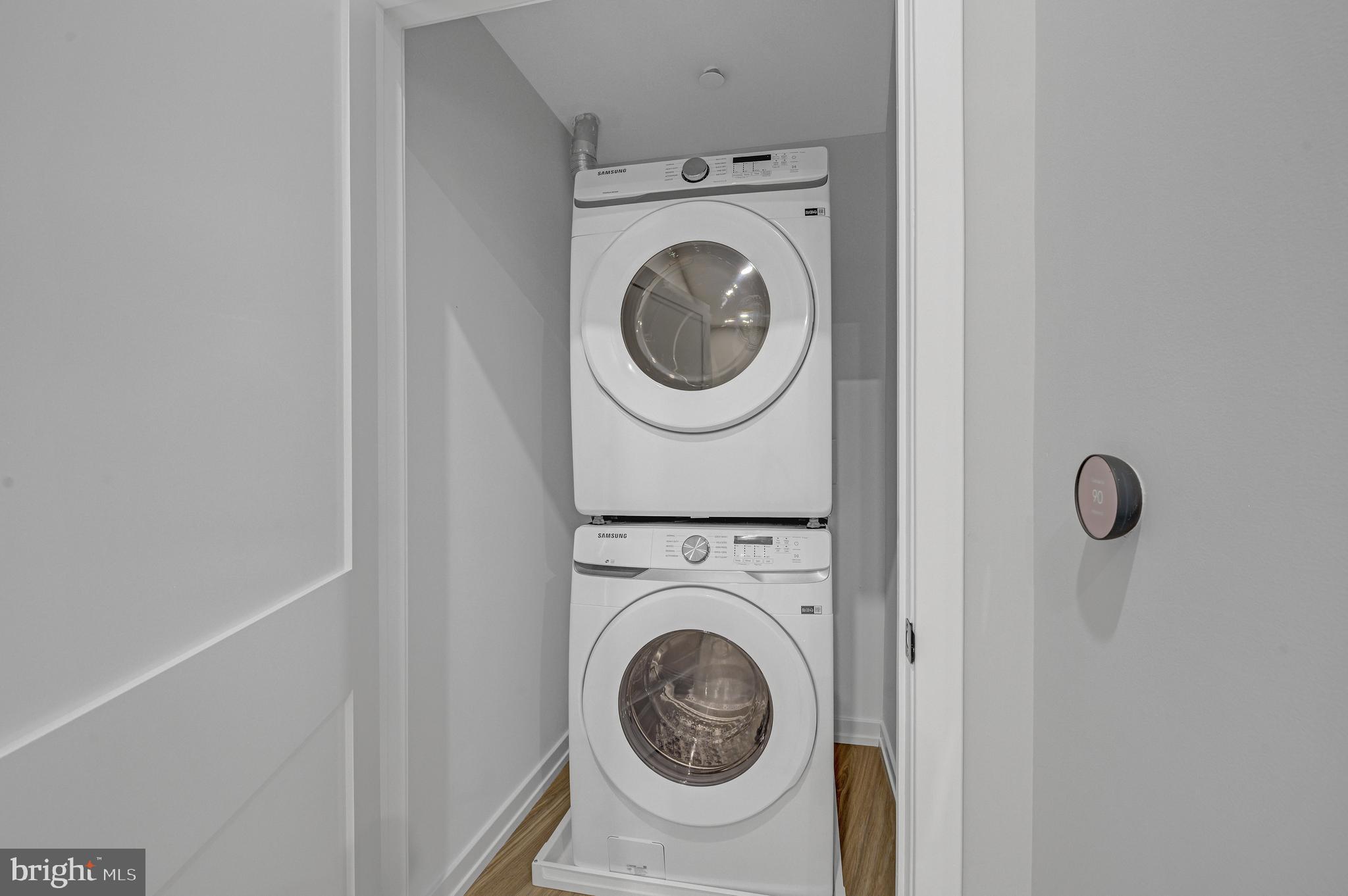 2445 Innovator Way, Unit 1A Philadelphia, PA 19146 - Photo 8 of 14 a utility room with dryer and washer