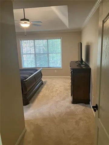 a room with a bed and a window