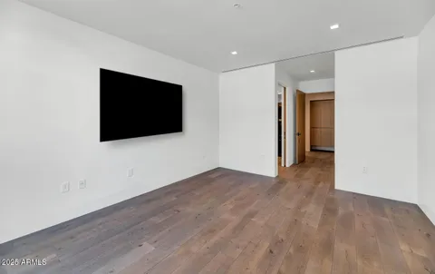 a view of a livingroom with wooden floor