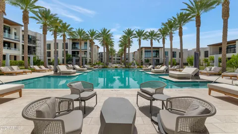 a view of a patio with couches table and chairs