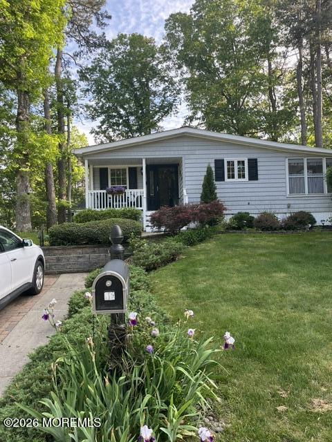 39 Hibiscus Place, Unit A Jackson, NJ 08527 - Photo 3 of 38 a front view of a house with garden