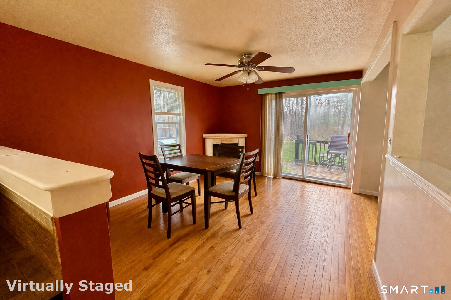 222 Parish Hill Road Scotland, CT 06264 - Photo 2 of 14 a dining room with furniture a chandelier and wooden floor