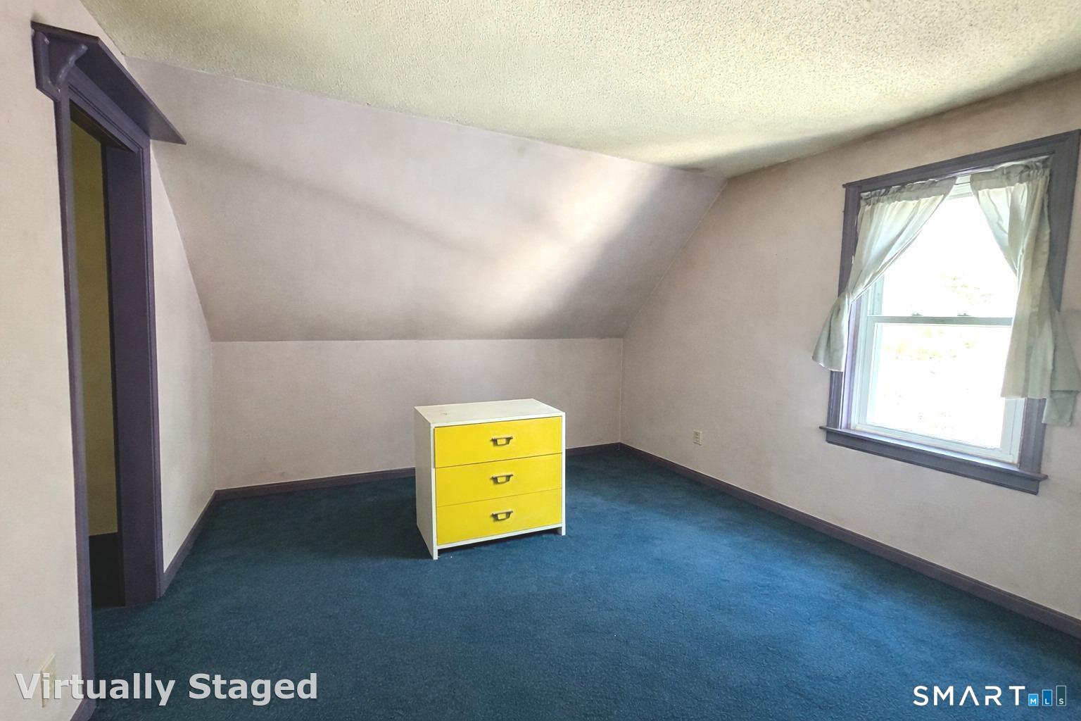 222 Parish Hill Road Scotland, CT 06264 - Photo 10 of 14 an empty room with a window