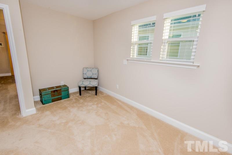 422 Plainview Avenue Raleigh, NC 27604 - Photo 11 of 25 an empty room with windows