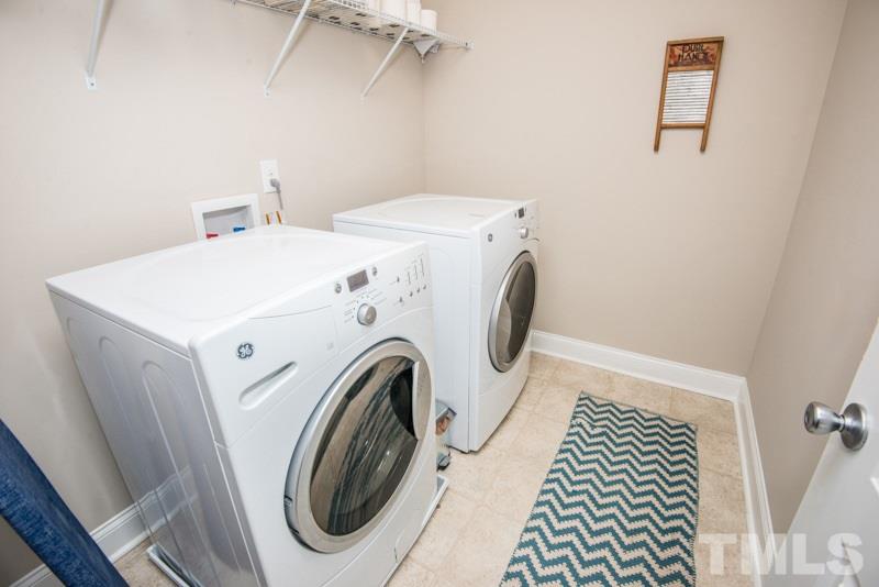 422 Plainview Avenue Raleigh, NC 27604 - Photo 12 of 25 a utility room with dryer and washer