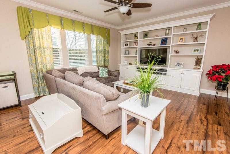 422 Plainview Avenue Raleigh, NC 27604 - Photo 3 of 25 a living room with furniture and floor to ceiling windows