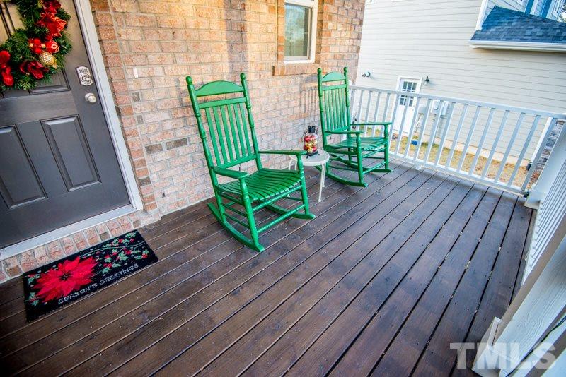 422 Plainview Avenue Raleigh, NC 27604 - Photo 9 of 25 a view of a chairs on the deck