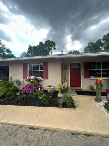 a front view of house with yard