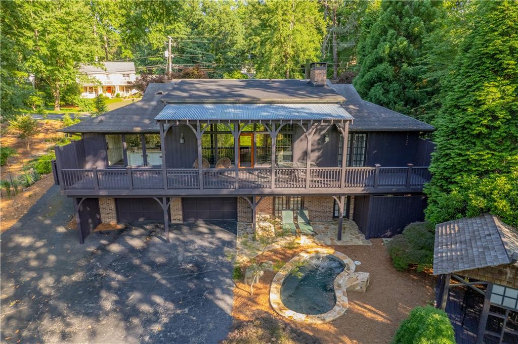 a view of a house with a yard balcony