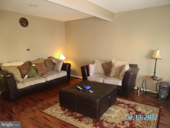 1322 Steed Street Ranson, WV 25438 - Photo 5 of 29 a living room with furniture and wooden floor