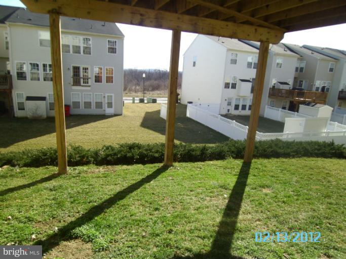 1322 Steed Street Ranson, WV 25438 - Photo 8 of 29 a view of a back yard
