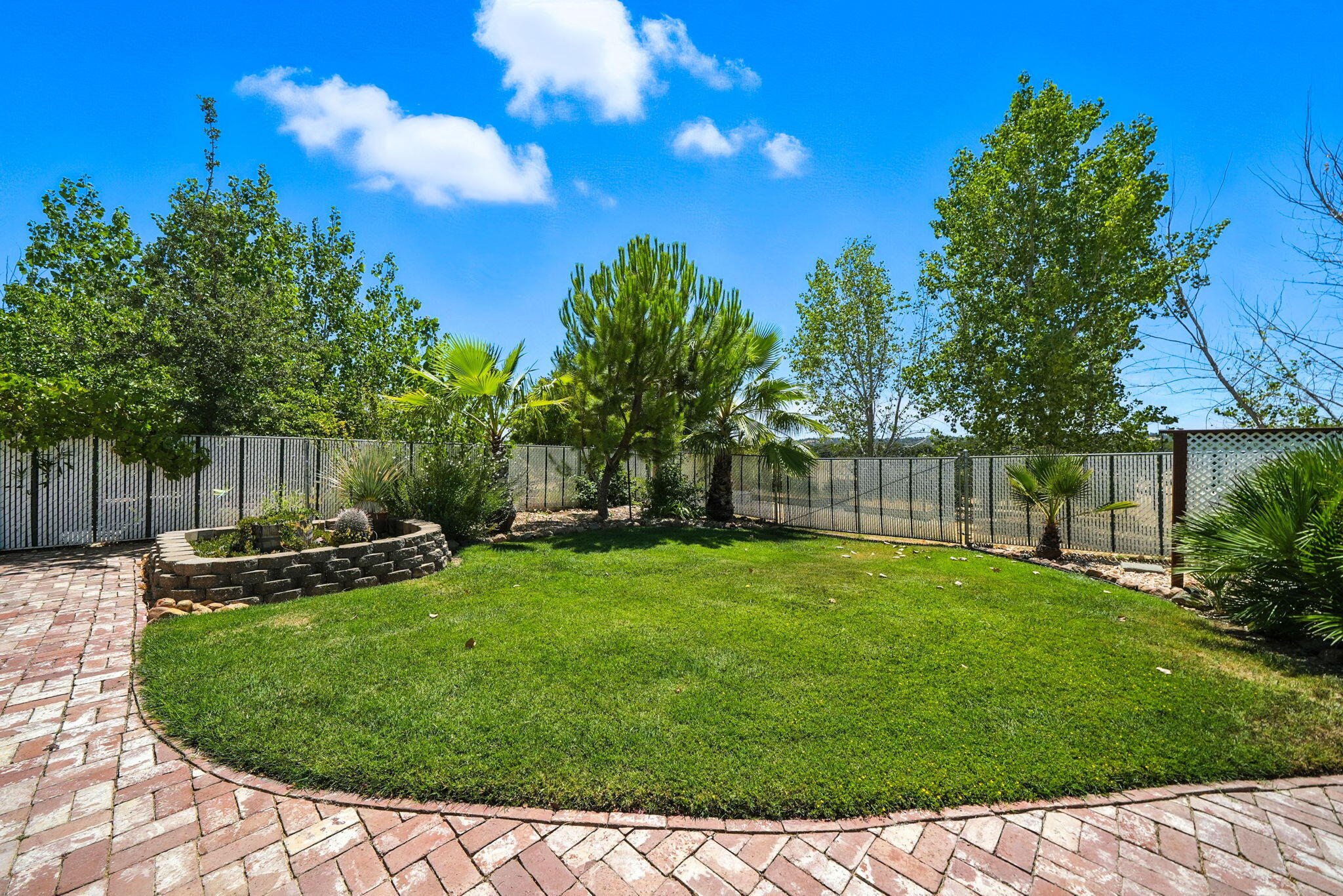 10750 Dixie Road Red Bluff, CA 96080 - Photo 41 of 75 a view of a backyard with a garden