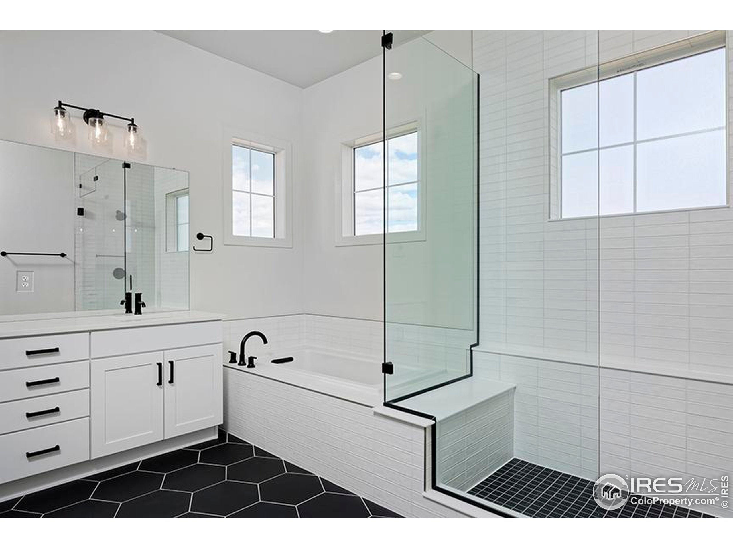 1738 Morningstar Way Fort Collins, CO 80524 - Photo 22 of 49 a bathroom with a bathtub and shower