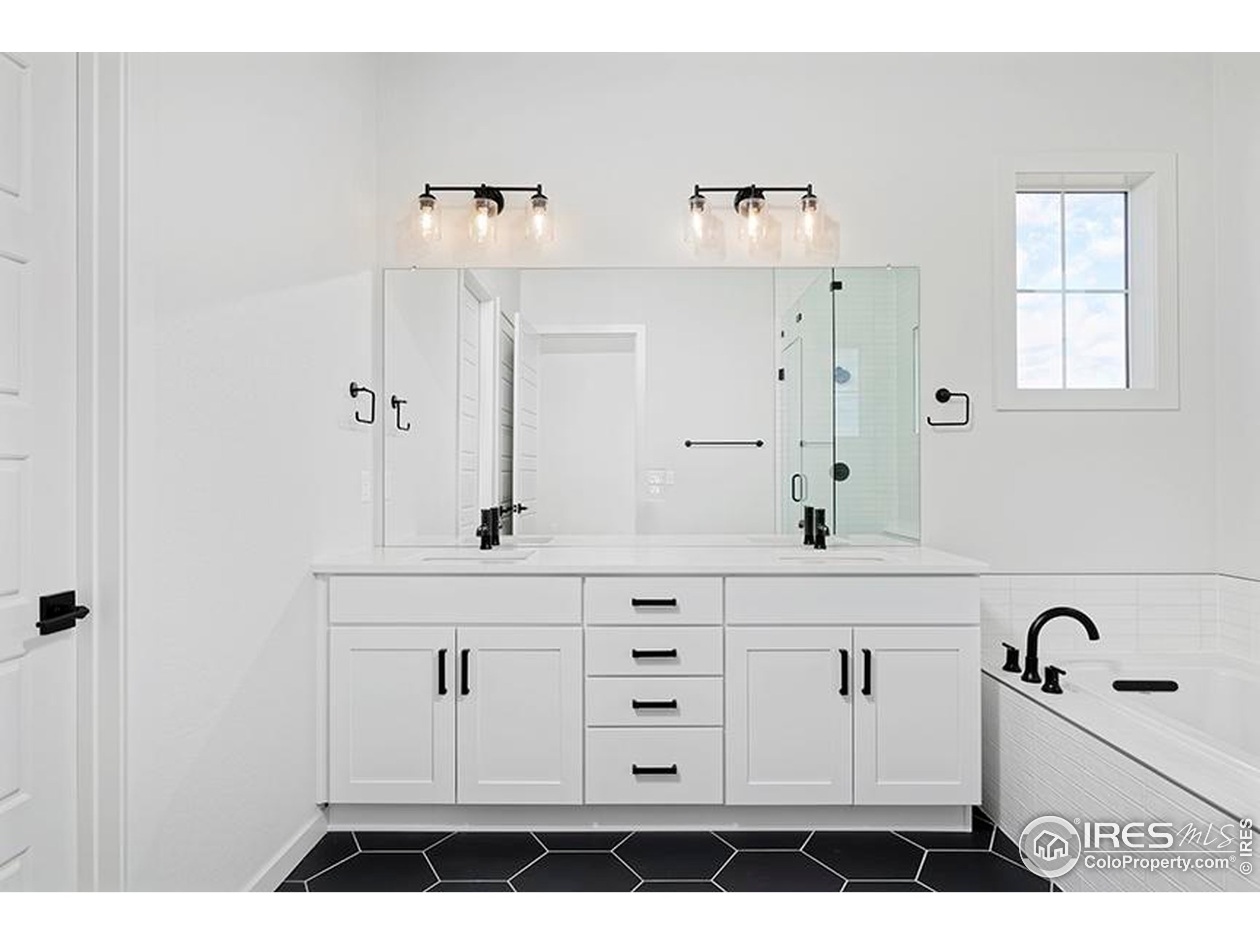 1738 Morningstar Way Fort Collins, CO 80524 - Photo 23 of 49 a view of cabinets with wooden floor