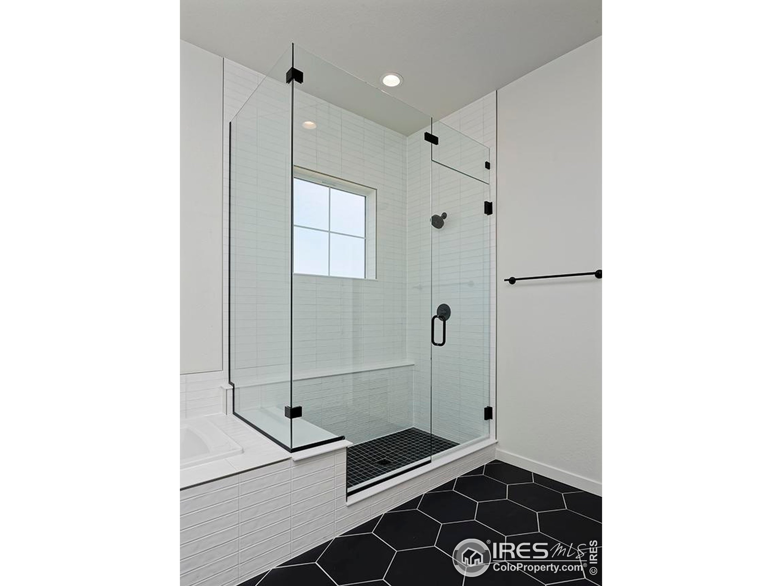 1738 Morningstar Way Fort Collins, CO 80524 - Photo 35 of 49 a bathroom with a shower