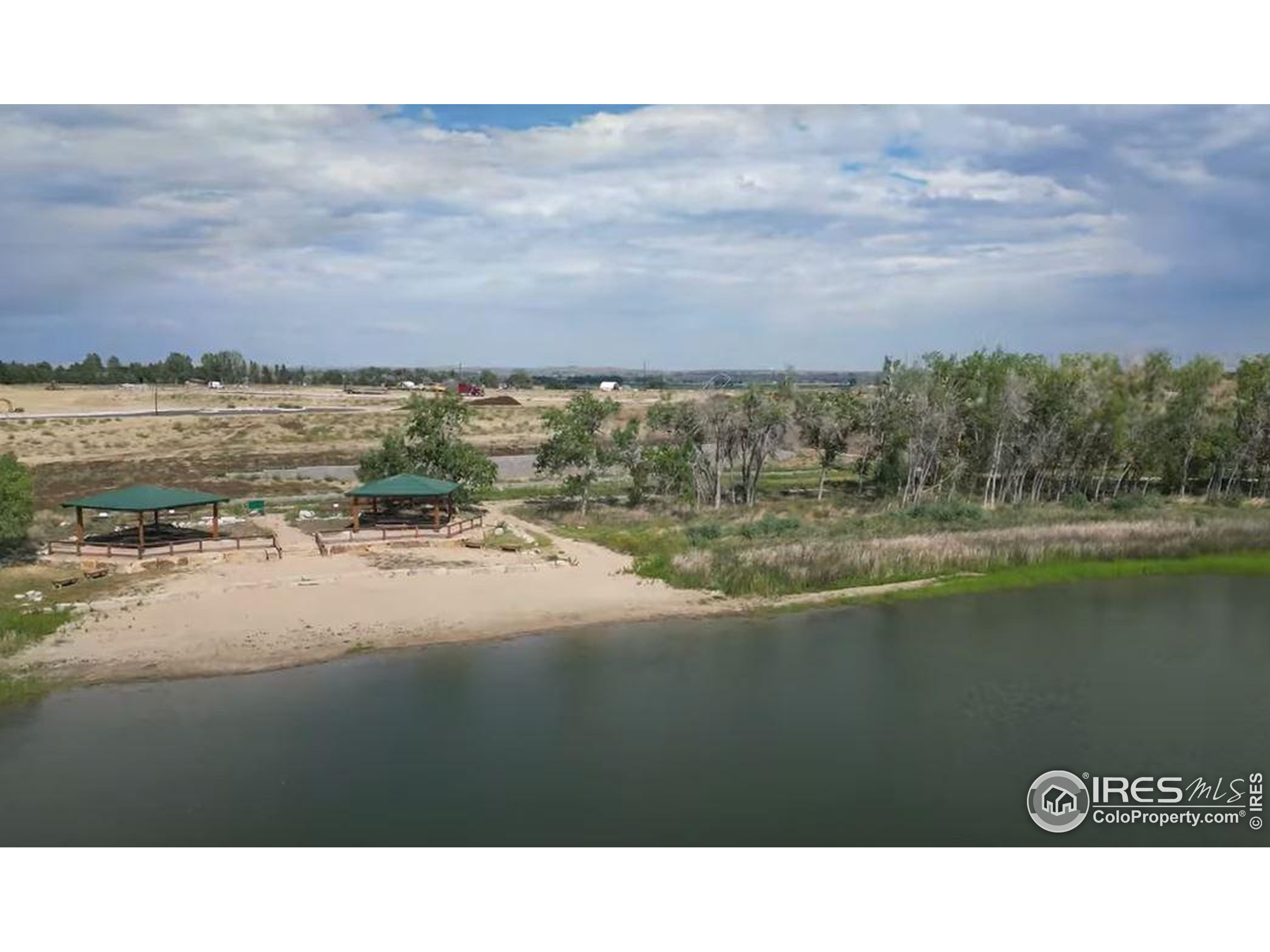 1738 Morningstar Way Fort Collins, CO 80524 - Photo 42 of 49 a black and white photo of a lake