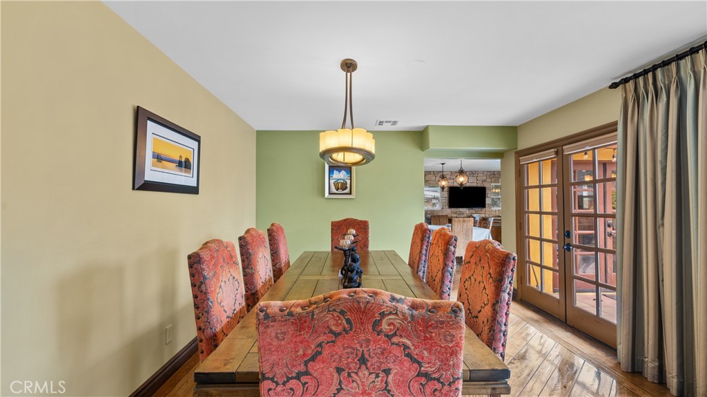 24604 Apple Street Newhall, CA 91321 - Photo 14 of 47 a dining room with furniture and window