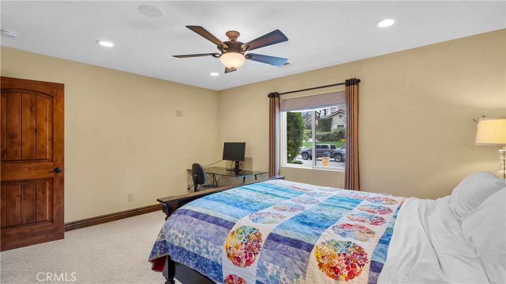 24604 Apple Street Newhall, CA 91321 - Photo 25 of 47 a bedroom with a bed and a window