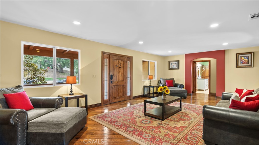 24604 Apple Street Newhall, CA 91321 - Photo 8 of 47 a living room with furniture and a window