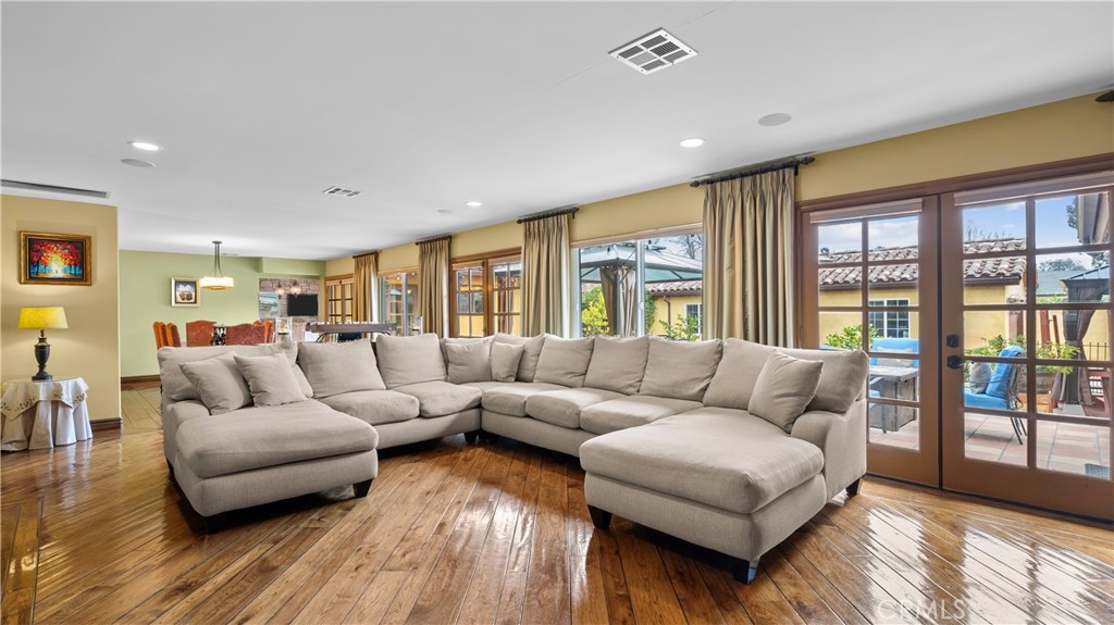 24604 Apple Street Newhall, CA 91321 - Photo 10 of 47 a living room with furniture and a large window