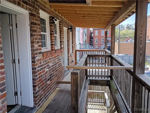 a view of balcony with deck