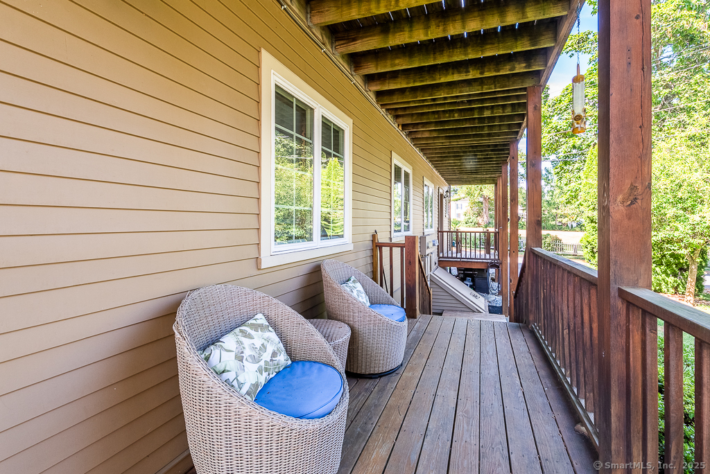 11 North Main Street Essex, CT 06426 - Photo 13 of 35 a view of balcony with couch and chairs