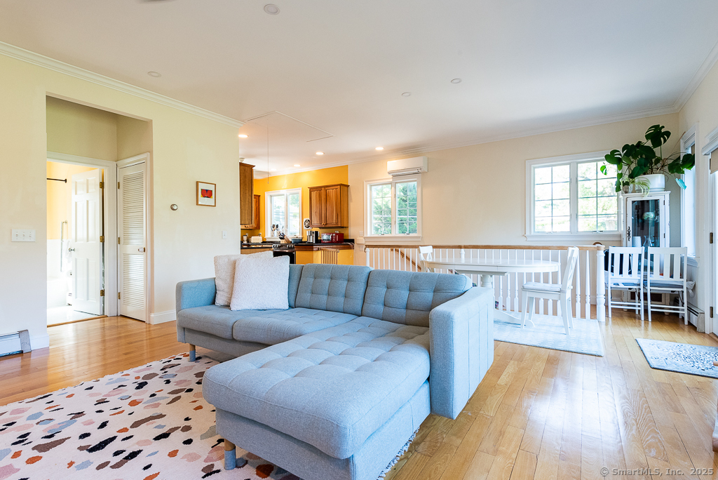 11 North Main Street Essex, CT 06426 - Photo 3 of 35 a living room with furniture and a table