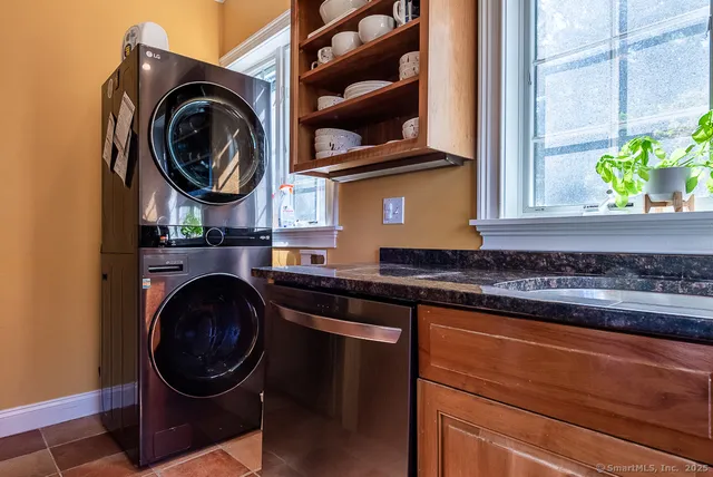 a kitchen with a stove and a sink