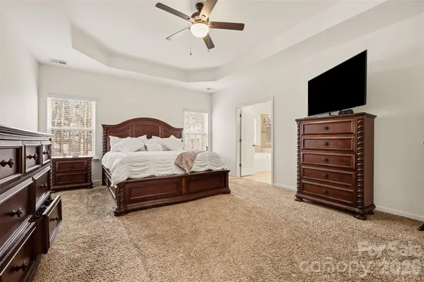 a bedroom with a bed and furniture