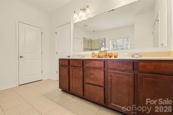 a kitchen with cabinets a sink and appliances