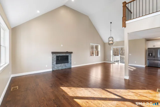 a view of a livingroom with wooden floor