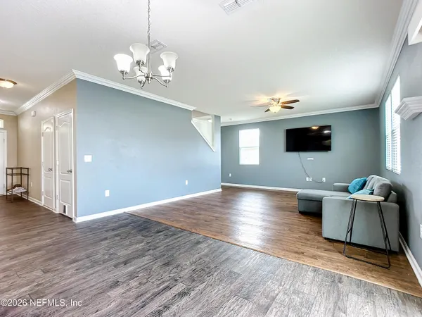 a view of livingroom with furniture and window