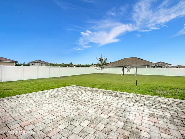 a view of a lake with a big yard
