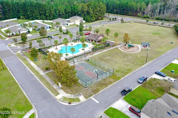 a view of swimming pool from a balcony